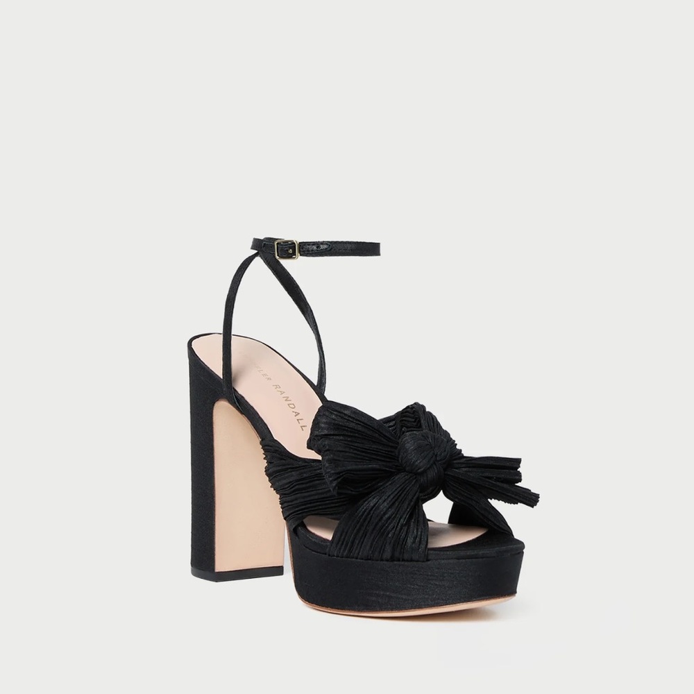 Natalia Black Platform Bow Heel
Regular price $450. Worn only once. Like new.